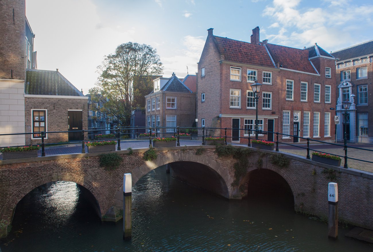 Brick arch bridge and canal houses