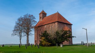 Rural church with graveyard in Groningen