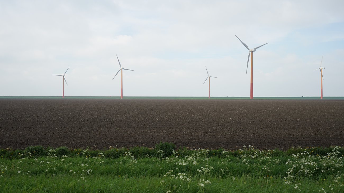Field with modern windmills Assen